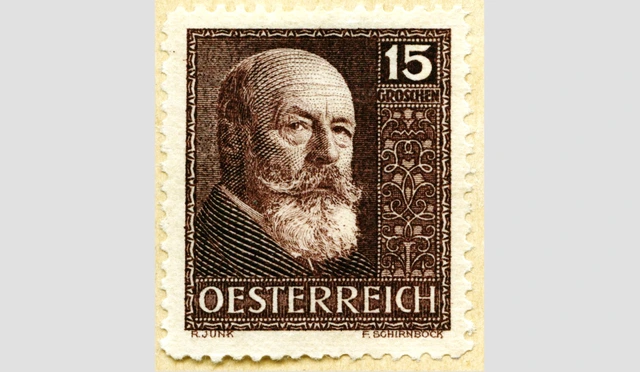 Braune 15 Groschen-Briefmarke mit Portrait von Bundespräsident Michael Hainisch.